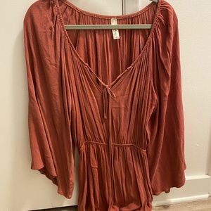 Mahina boutique mauve/rust romper!